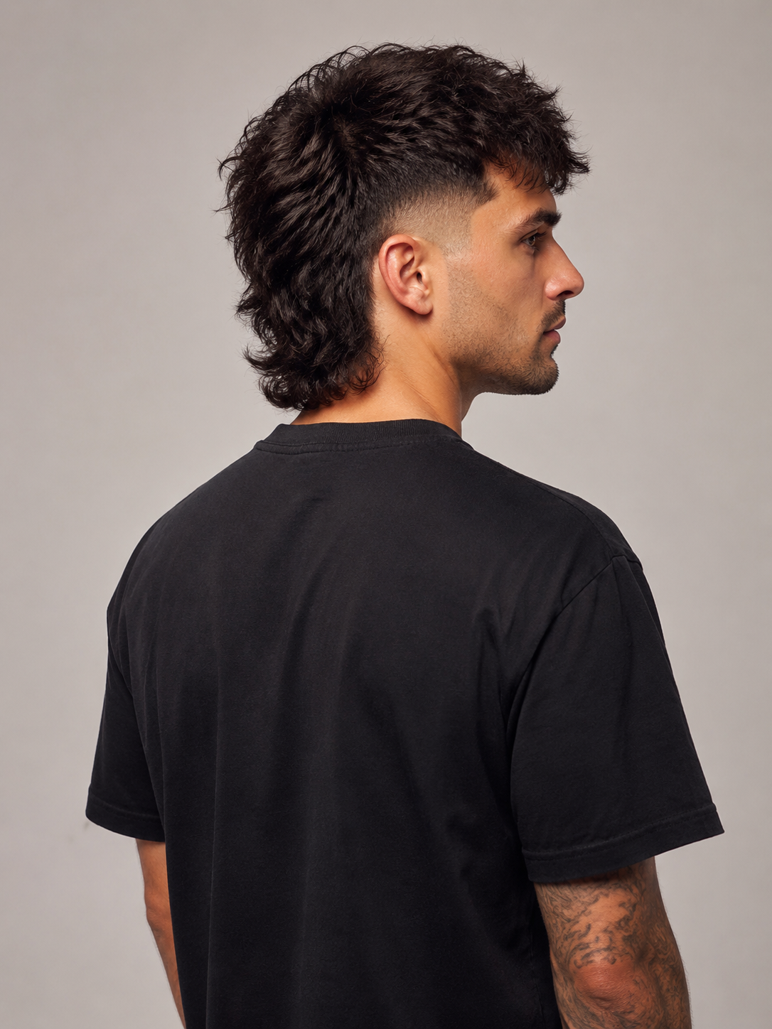 drop fade mullet with textured top and longer back