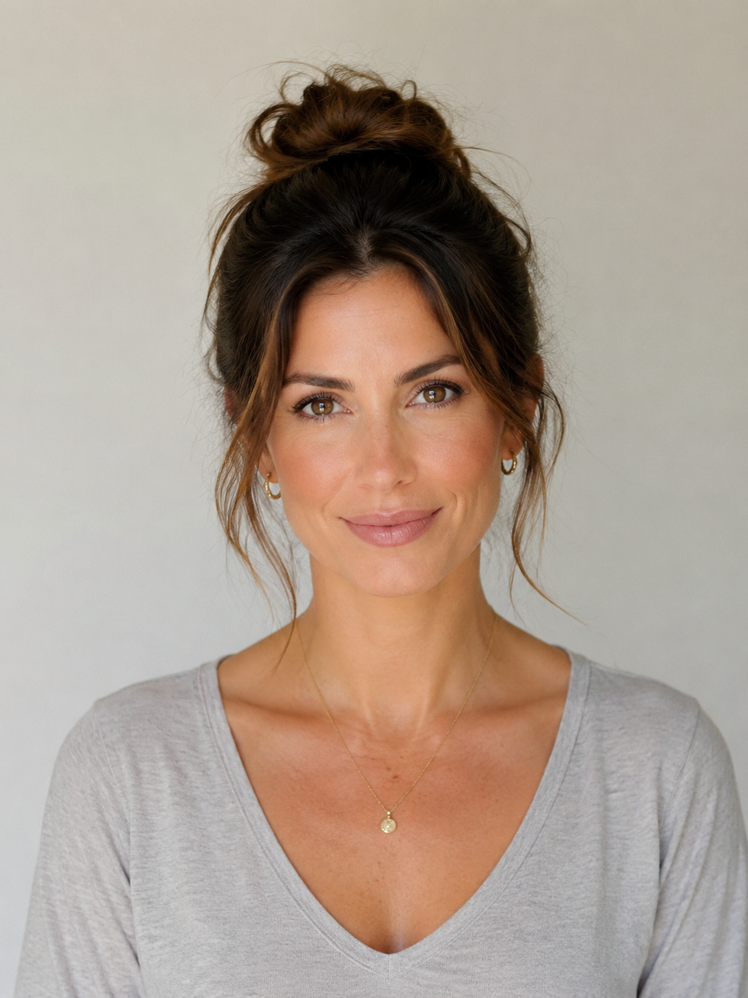 low maintenance messy bun hairstyle