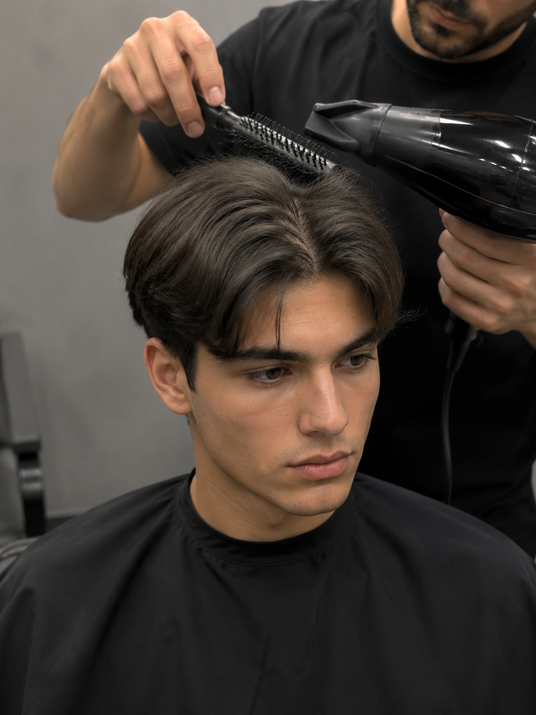 styling middle part haircut with blow dryer